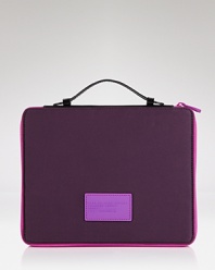 Get your iPad case on point. This neoprene sleeve from MARC BY MARC JACOBS flaunts a streamlined design with the added on-the-go ease of a top handle.