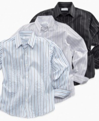 Build up the basics. A collared, button down shirt from Calvin Klein gets stylish with stripes and can dress up any pair of jeans or pants.
