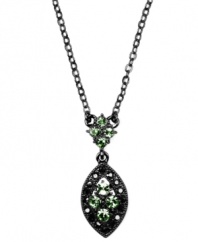 Geometric effect. A chic marquise-shaped pendant sets apart this striking necklace from Givenchy. Crafted in hematite tone mixed metal, it's embellished with sparkling glass accents in a pretty pale green hue. Approximate length: 16 inches + 2-inch extender. Approximate drop: 1 inch.