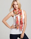 Warm up your spring ensemble with a light and airy scarf featuring a gorgeous floral print.