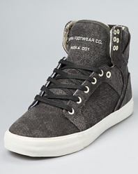 As usual, Supra stuns with this outsized take on the classic high-top, with a wash canvas shell and padded tongue and collar.