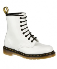 The Dr. Martens Women's 1460 8 Eye Boots shine in a high-gloss patent finish for a whole new generation of style.