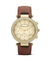MICAHEL Michael Kors perfects boy-borrowed accessorizing with this classically styled watch. Its leather strap and over-sized face are handsome while a glitzy bezel adds a glamorous hint of femininity.