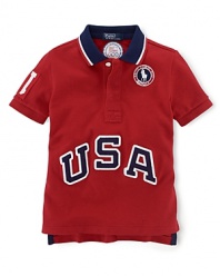This breathable cotton mesh polo celebrates Team USA's participation in the 2012 Olympics with bold graphics and embroidery.