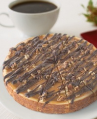Smooth, buttery caramel is layered with golden, toasted pecans and topped with a splash of chocolate...is your mouth watering yet? A celebrated favorite, this delectable Turtle cheesecake is perfect for sharing with guests or savoring by yourself!