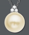 Poignant and polished. This simply stunning pendant features a cultured freshwater pearl (9 mm) accented by three, round-cut diamonds. Setting and chain crafted in 14k white gold. Approximate length: 18 inches. Approximate drop: 1/2 inch.