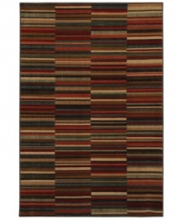 Simply modern, the Kaleidoscope area rug brings vibrant style in a non-traditional stripe design that's sure to complement any room's décor. Completely crafted in the USA, it is woven of soft, durable olefin in a lush pile that withstands heavy traffic anywhere in the home.