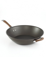 A deep, rich chocolate tone, with a superior nonstick finish and bowl-shaped high sides that keep contents in the pan and not on the floor, turns things up in the kitchen, making every meal a mixture of sophistication and ease. Constructed for professional performance with a hard-anodized construction, impact-bonded stainless steel base and dishwasher-safe finish. Lifetime warranty.