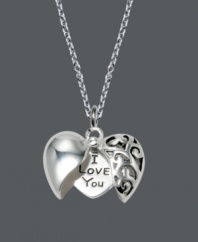 The secret's out -- you're in love! This hidden message pendant by Unwritten is the perfect way to express your feelings. An intricate, filigree heart opens to reveal the words, I Love You. Crafted in sterling silver. Approximate length: 18 inches. Approximate drop: 3/4 inch.