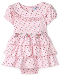 Polka dots and ruffles galore adorn this fresh spring dress from Hartstrings. The matching bloomer moves with her as she explores her world.
