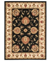 Bring the brilliance of ancient Persian textile design home with this dark and captivating Lyndhurst area rug from Safavieh. Crafted from soft polypropylene, this rug radiates timeless allure with the added convenience of easy-care construction. (Clearance)