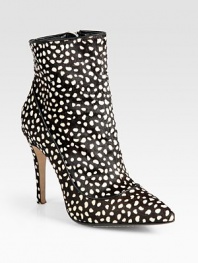 Finished with an abstract polka-dot print and exposed side zipper, this calf hair ankle boot has a substantial heel and point toe. Self-covered heel, 4 (100mm)Printed calf hair upperSide zipperLeather lining and solePadded insoleImportedOUR FIT MODEL RECOMMENDS ordering one half size up as this style runs small. 