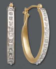Fit for a diva. These oval-shaped hoops get a touch of extra glam with the addition of sparkling diamond accents. Crafted in 14k gold. Approximate diameter: 3/4 inch x 1/2 inch.