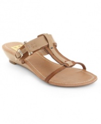Straps on straps on straps! Tommy Hilfiger's Merci wedge sandals aren't your average dainty t-strap. Metal hardware detailing keeps these cute wedges nice and rugged.