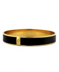 Everyone knows that black is a staple in every fashionista's wardrobe. This simple cuff bracelet design by Vince Camuto is no exception. A black patent leather strip makes this versatile bangle a must-have for your collection. Crafted in gold tone mixed metal. Approximate diameter: 3 inches.
