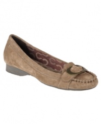 Part loafer and part moccasin, Dr. Scholl's Trina flats add up to one comfortable shoe! With a round-toe silhouette, they feature a metal ornament on the vamp as well as stitched detailing at the toe. Made in leather or suede, and available in a choice of colors.