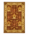 Savor the natural landscape. This sublime rug from the Anatolia collection features deep color, rich texture and a nature-inspired tableau. A latticework pattern overlaying the earth-toned palette and graceful botanic shapes recalls the serene experience of gazing through a window. Hand-tufted of fine wool and dyed using an ancient pot dying technique.