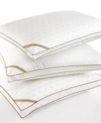 The luxury of comfort. Featuring a plush synthetic fill for softness, this Calvin Klein Signature Down Alternative Density pillow provides firm support for your head and neck as you rest. A generous 1.5 gusset finished with caramel piping gives just the right amount of volume. Also features a subtle, allover print of the Calvin Klein logo.