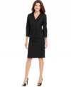 Le Suit's skirt suit looks extra sleek with a collarless, three-quarter-sleeve jacket and a flattering skirt fit. This suit is a cinch to wear from desk to dinner when paired with a stylish shoe.
