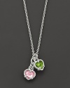 Chain necklace with twin heart charms in pink and peridot crystal. Designed by Judith Ripka.