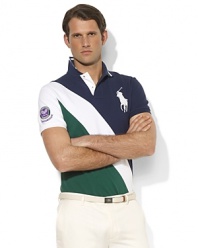 Designed exclusively for Ralph Lauren's collection celebrating the Wimbledon Championships, a classic short-sleeved polo shirt is tailored for a trim, athletic fit from breathable cotton mesh in a preppy color-blocked design.