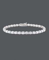 For a look that's red-carpet worthy...strike a pose in B. Brilliant! This eye-catching tennis bracelet features dozens of sparkling, channel-set cubic zirconias (10 ct. t.w.). Crafted in sterling silver. Approximate length: 7-1/4 inches.