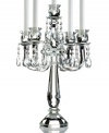 Truly stunning, the Old Vienna candelabra brings the opulence of ages past to today's most elegant interiors. A faceted crystal base and curved arms dangling with glistening crystal beads will become the focal point of any setting. From Lighting by Design.