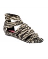 Cage your feet in the most exotic print. Betsey Johnson's Aero's flat sandals put some punch in your day.