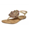 Haute hippie. The flat Jamae thong sandals by Report feature an earthy cork footbed topped off with a beaded rosette.