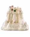 Make the townsfolk of Mistletoe Park Village sing with the addition of this fine porcelain figurine. A troupe of traditional Christmas carolers evokes the most cherished sounds of the season. With gold detail and glitter. Qualifies for Rebate