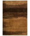 Richly textured, Calvin Klein's collection of luster-washed rugs bring an element of earthy, modern luxury to your home. The copper rug is handcrafted of plush wool in russet and coffee tones and finished with a special wash to produce an elegant patina.