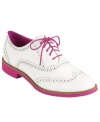 Pretty pink accents feminize this classic oxford style by Cole Haan. The Allisa featues a padded leather sock lining and a lightweight EVA outsole.