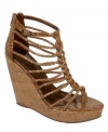 Metallic, strappy, and caged, the Caravan wedges by Carlos by Carlos Santana are not for the feint of heart.