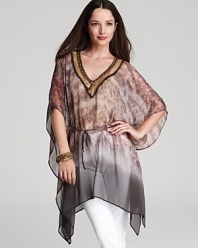 Embark on a quest to traveler-chic in this XCVI tunic blazing with mixed textures, tones, and prints. Play up the global aesthetic with layered beads and stacked bangles.