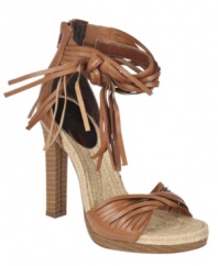 Fiercely fresh. The Villa sandals from Carlos by Carlos Santana show off your fashion attitude with espadrille styling, plenty of fringe, and a sexy, stacked heel.