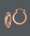 Get everlasting style in a sweet kiss of caramel. B. Brilliant's trendy 14k rose gold over sterling silver hoop earrings feature a click backing and dozens of bezel-set, round-cut cubic zirconias (1-1/3 ct. t.w.). Approximate diameter: 1/2 inch.