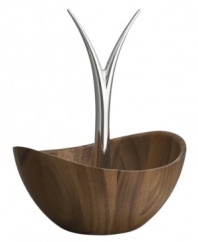 Feast your eyes on the Gourmet fruit bowl. Designer Wei Young combines Nambe metal with acacia wood in a design that simultaneously holds fresh, whole fruits and dangles delicate grapes and bananas.