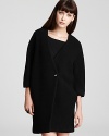 Rock the voluminous trend with this Thakoon Addition coat featuring a fashionable cocoon shape.