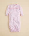 Your precious pre-crawler will be as cozy as a bug in a rug in this ruffled gown from Kissy Kissy.