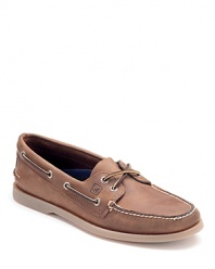 The classic boat shoe, hand-sewn for a crafted look and feel. Leather lace closure and detail along the sides, moc toe with contrast stitching and contrast rubber sole.