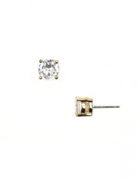 Traditional elegance. Givenchy's simple, yet stunning, stud earrings get a glamorous new look thanks to sparkling round-cut crystals. Crafted in gold tone mixed metal. Approximate diameter: 7 mm.