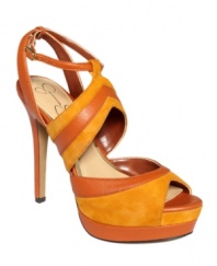 Suede and leather, a most perfect pair. With overlapping colorblocked straps, Jessica Simpson's Emen platform sandals come in several vivid colorways. You're sure to find one you love.