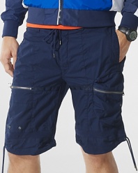 Metal zippers and grommets give a modern moto-inspired look to an essential cargo short in lightweight cotton poplin.