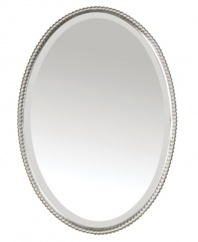 The Sherise mirror has a traditional pearl border as part of its hand-forged metal frame which features a gleaming brushed nickel finish. The elegant oval mirror has a beveled edge, and it can be hung either vertically (shown) or horizontally, depending on the space or your preference.