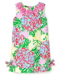 Bold and beautiful style from Lilly Pulitzer, this floral printed shift is accented with rosettes along the scoop neck.
