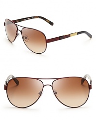 These Tory Burch aviators fly first class in fashion with ultra-chic colorblocked sides.