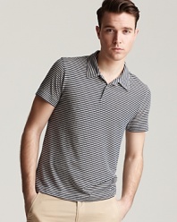 Under a blazer or featured with chinos, this striped slim fit polo adds trans-Atlantic chic to your casual look.