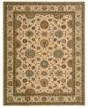 Floral medallions connected by a complex labyrinth of vines distinguish the well-composed design of this rug. Machine woven from the highest quality wool and meticulously dyed for a richly varied color palette to bring a unique accent of luxury to the home.