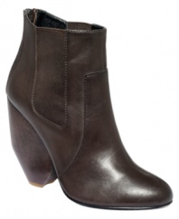 Take a look at that heel. RACHEL Rachel Roy's Quendal boots have an unique chunky wooden heel that adds depth to this polished boot. Elastic gore on the sides provides a roomy, customized fit.