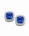 Sparkling and sublime. Eliot Danori's sophisticated stud earrings add a touch of elegance with a cushion-cut blue glass center surrounded by sparkling crystal accents. Crafted in silver tone mixed metal. Approximate diameter: 1/2 inch.